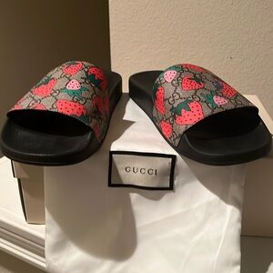 Gucci slides.